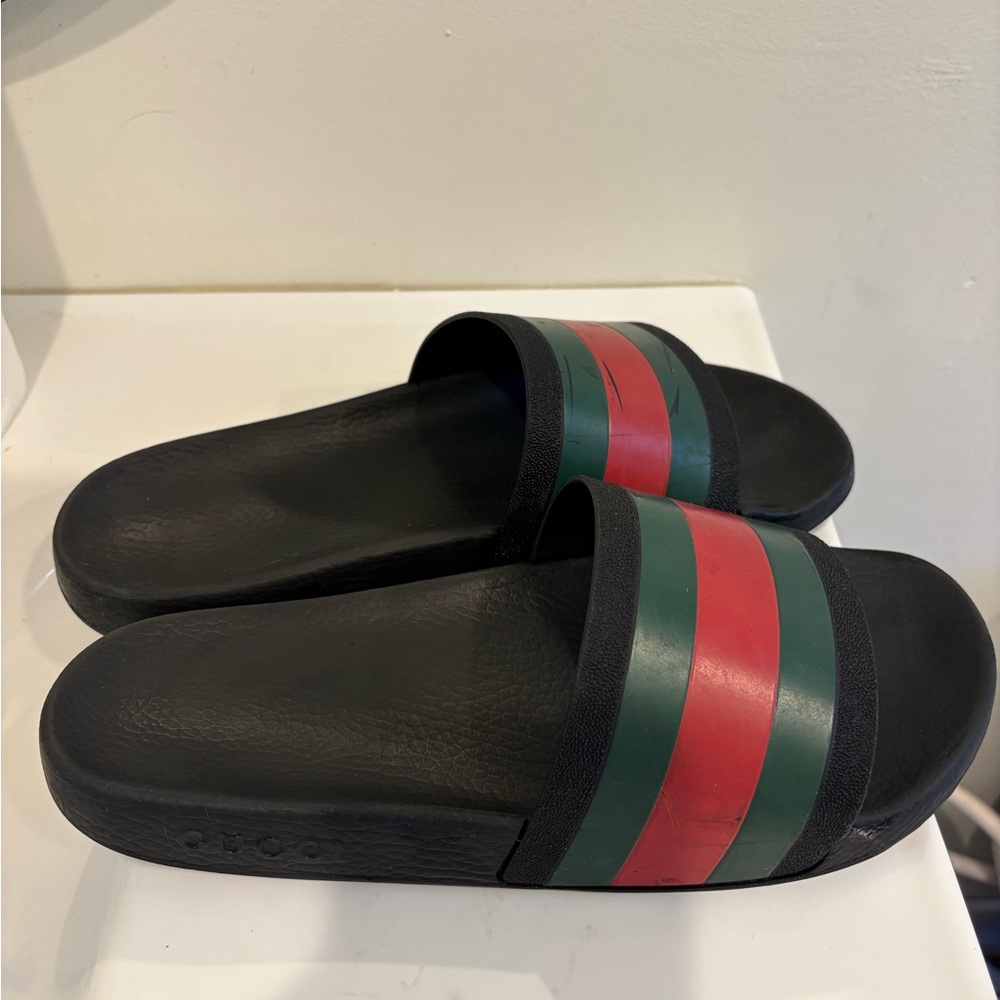 Gucci Men’s Rubber Slides with iconic branding